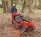 Red and black TORO Stump Grinder, 35 HP, Hydraulic