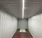White and brown GENERIC 40 ft. by 8 ft. by 8.5 ft. Storage Container, Solar Lights
